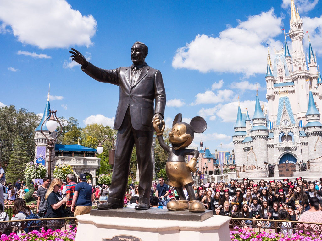 People enjoying near the famous Disney castle