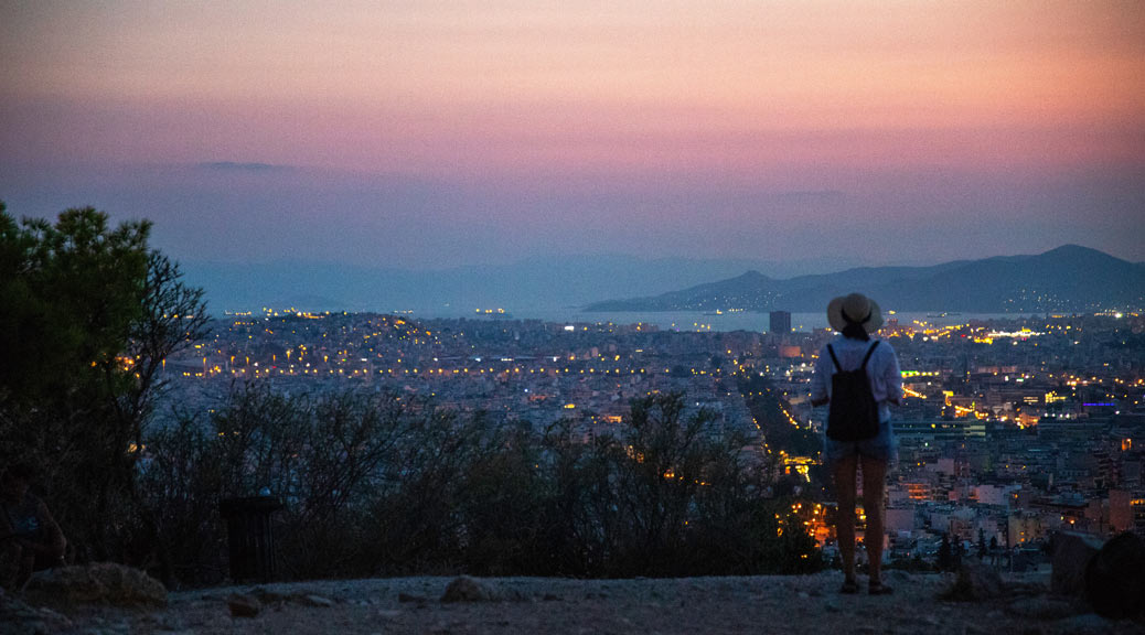 Traveller touring the city at sunset