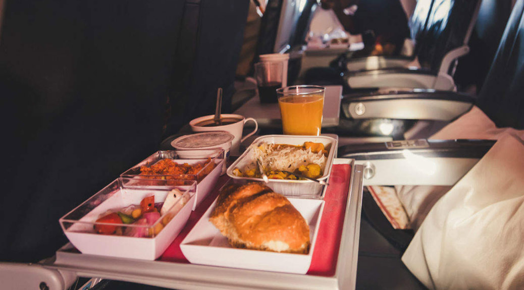 Passengers Having Snacks at Plane