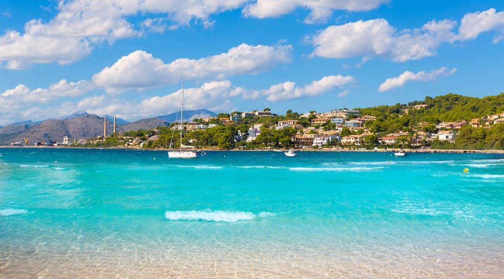 Boats and yachts seen on Platja de Alcudia Auanada beach in Mallorca Majorca Balearic islands