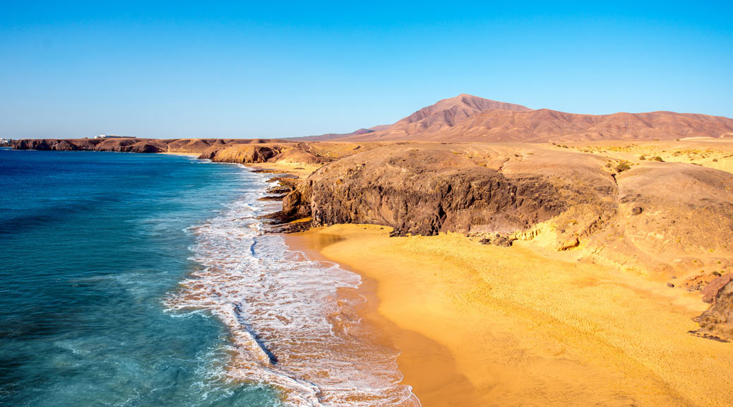 Papagayo beach near Las Coloradas resort on the south of Lanzarote island in Spain