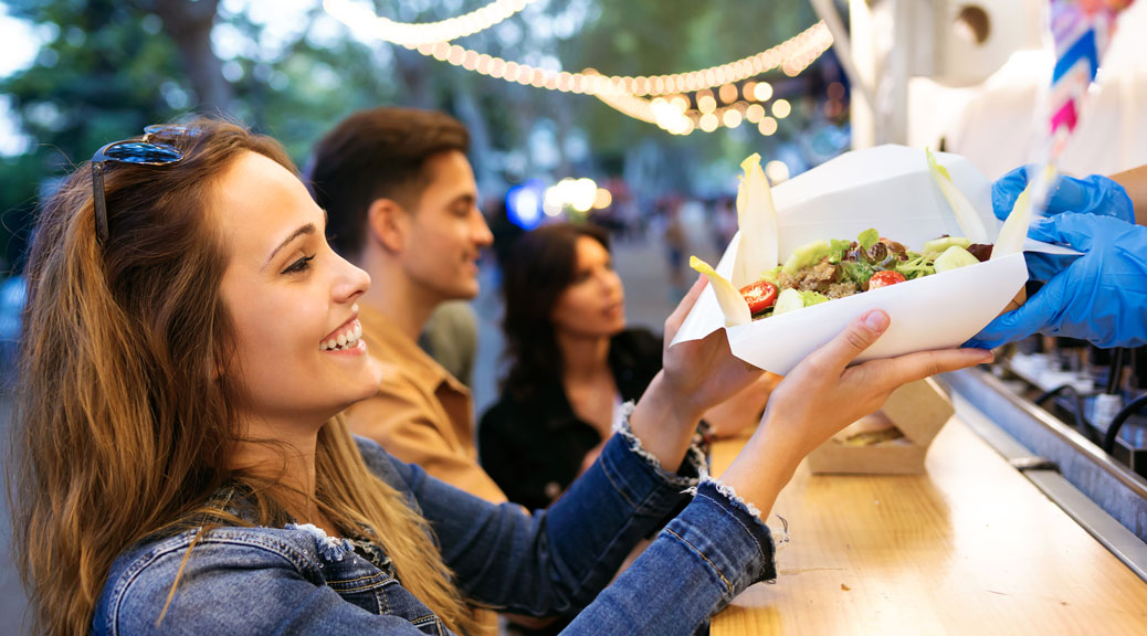 buying different types of fast food in eat market in the street