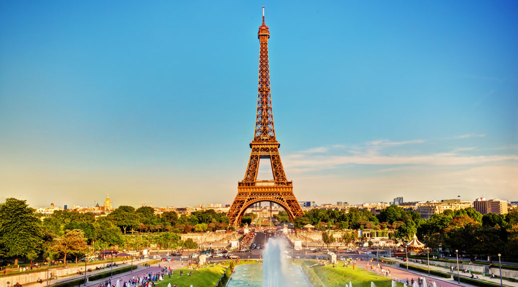 Eiffel Tower seen from fountain at Jardins du Trocadero at a sunny summer day, Paris, France