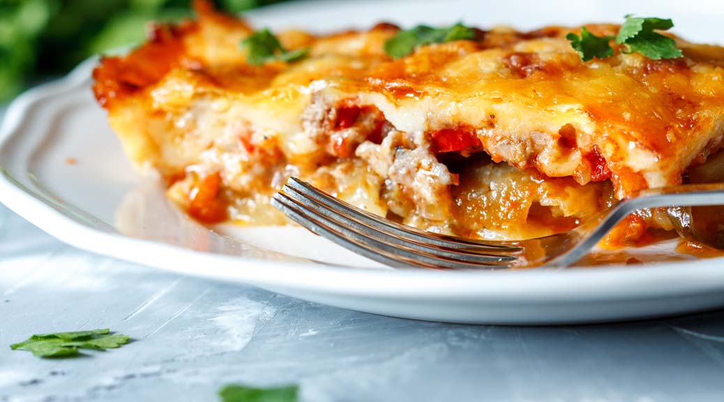 Greek style moussaka with eggplants ground beef and potatoes.