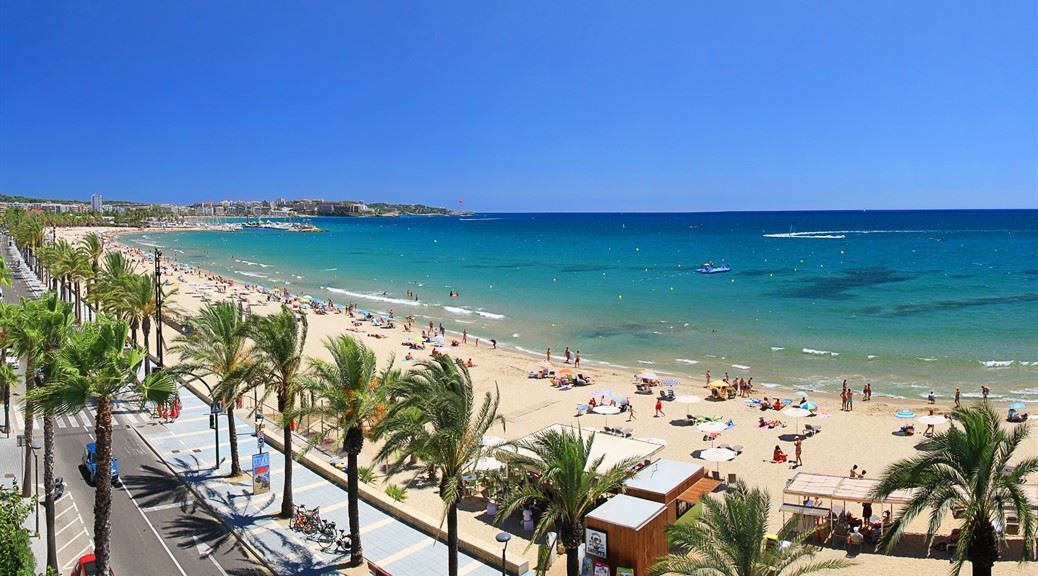 Beautiful beach view from hotel balcony during clear sunny day