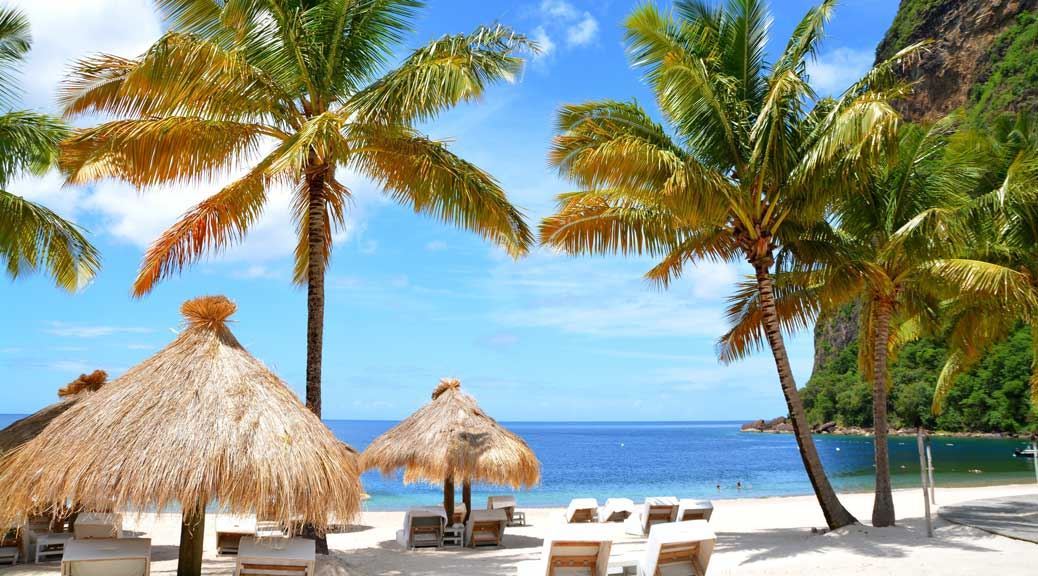 Exotic tropical beach with white sand between the two Pitons in caribbean