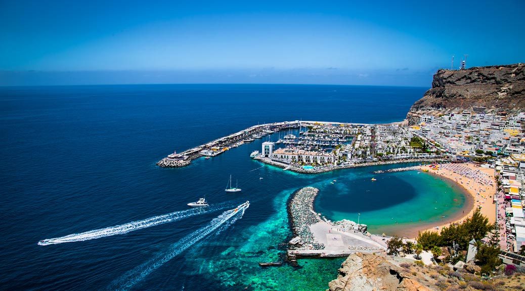 stunning blue water and beach in a beautiful sunny day gran canaria