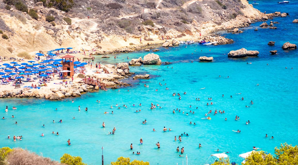 People at the famous beach of Konnos Bay beach near Protaras, Ayia Napa. Famagusta District, Cyprus