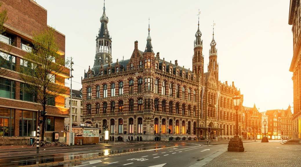 off the beaten track dam square morning amsterdam netherlands