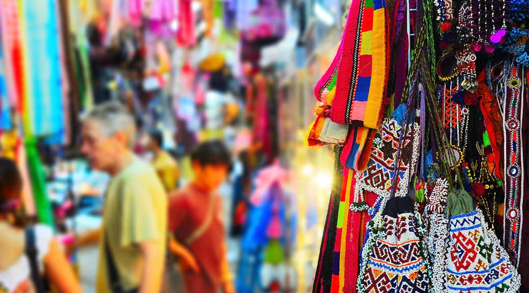 tourists from around the world busy shopping in the streets of Paris